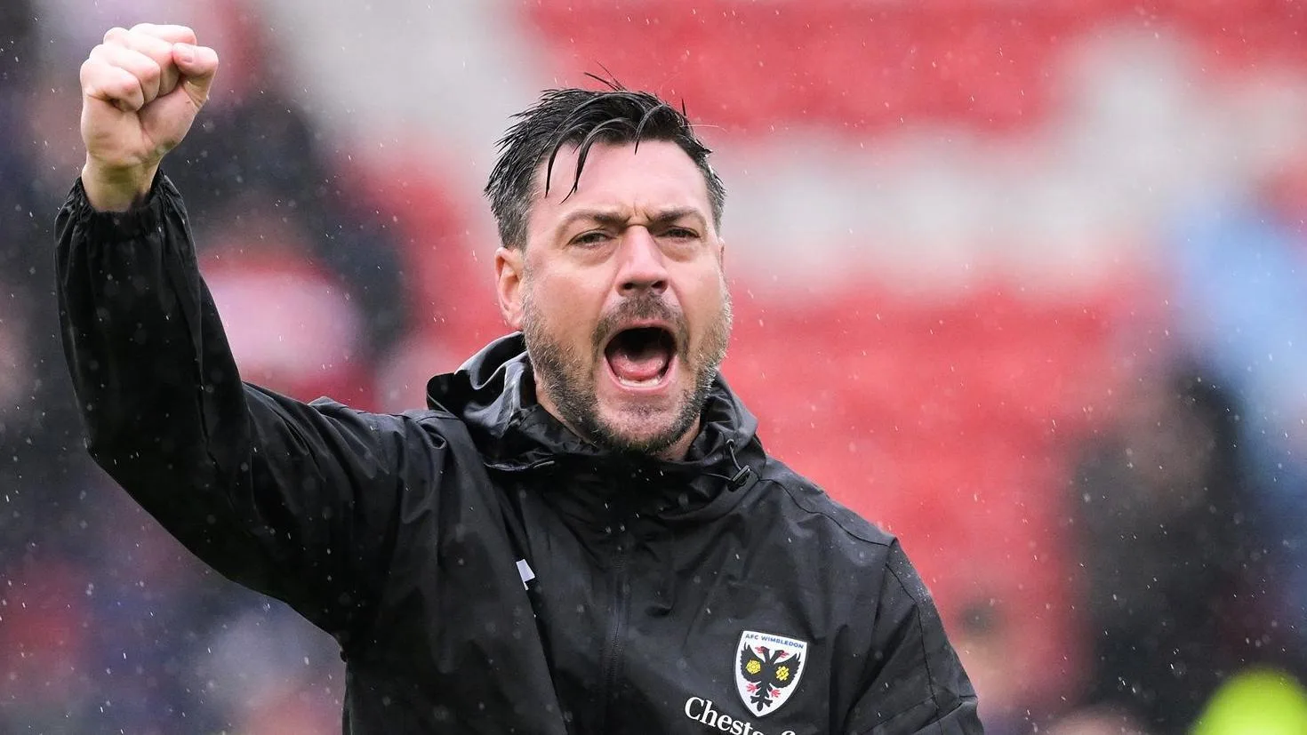 Wimbledon boss Jackson signs new contract