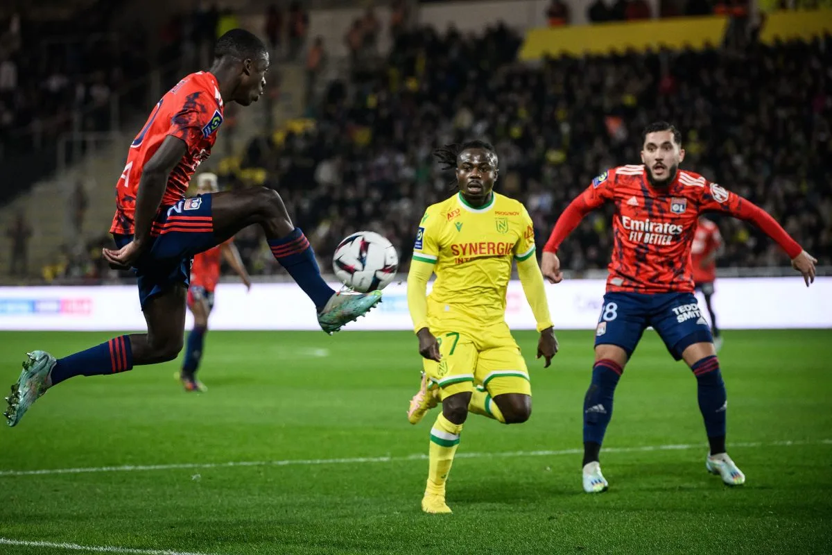 Saël Kumbedi joins Wolfsburg permanently from Lyon after loan clause is met